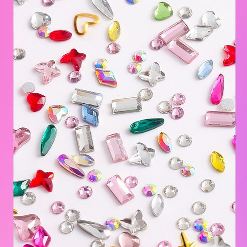 Close-up of assorted colorful tooth gems